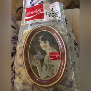 Unopened Coca Cola Vintage Style Change set of 3 Trays 

$5